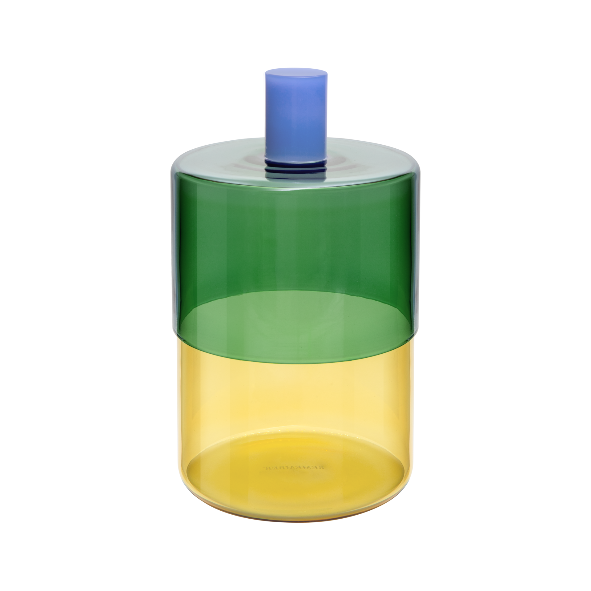 Hohe, zylindrische Glasdose mit zwei transparenten Farbbereichen: unten leuchtend gelb, oben tiefes Petrolgrün. Verschlossen mit rundem, opakem Deckel in hellem Petrolblau und zylindrischem Griff in dunklerem Blau.