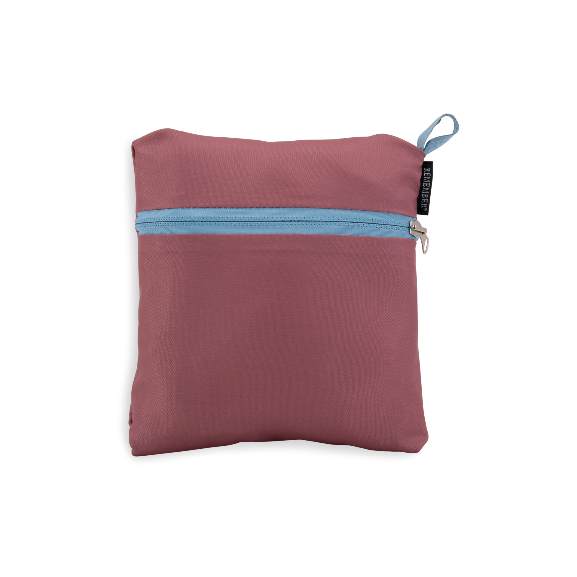 Folded, aubergine-coloured travel bag with a light blue zip on a white background. Small blue ribbon with "Remember" printed on it hangs down the side.