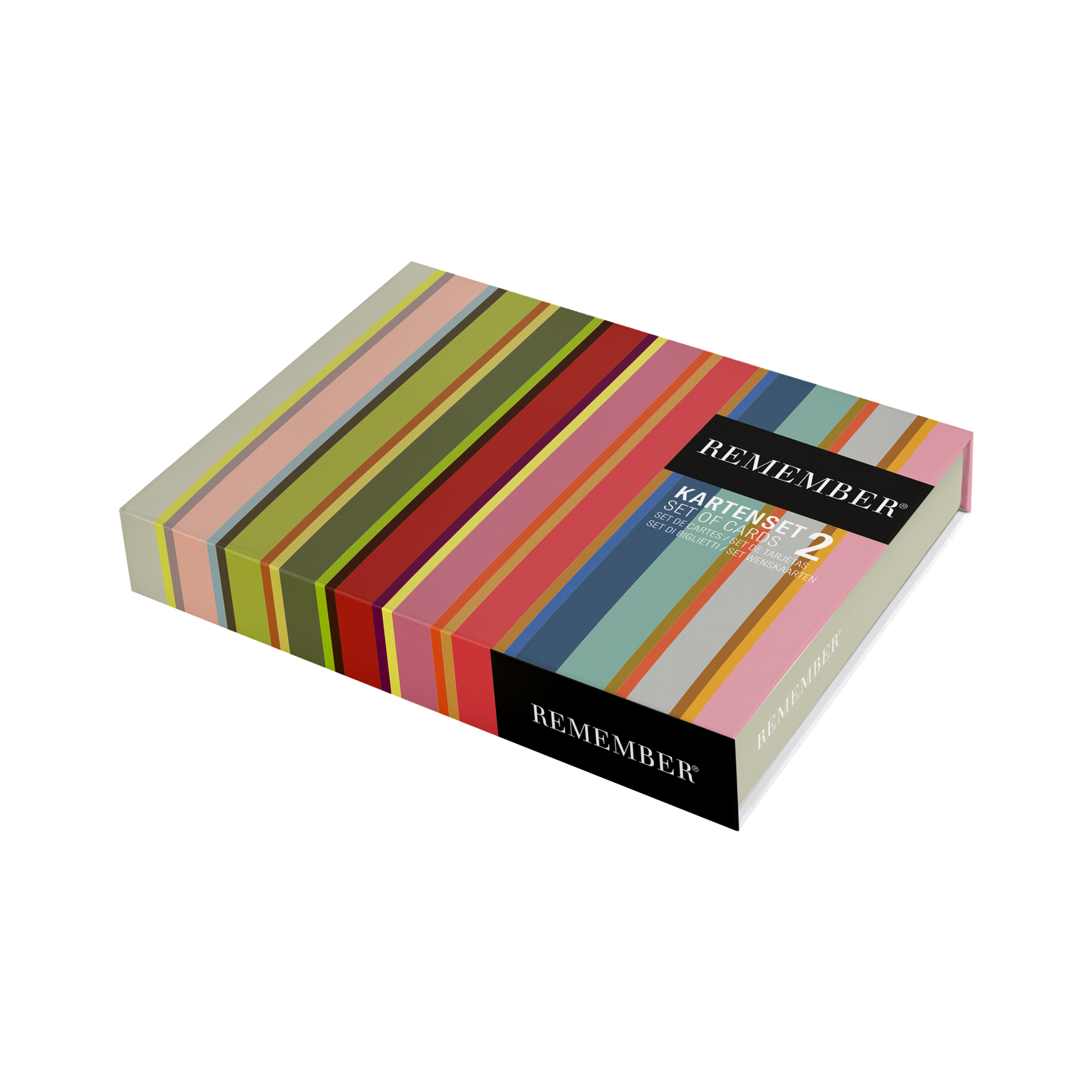 Bunte, gestreifte Magnetbox für das Kartenset Remember 2, leicht schräg von oben. Oberfläche mit vielen vertikalen und diagonalen Streifen in Pink, Grün, Rot, Gelb, Blau und Grau. Schwarzes Etikett: REMEMBER Kartenset 2.