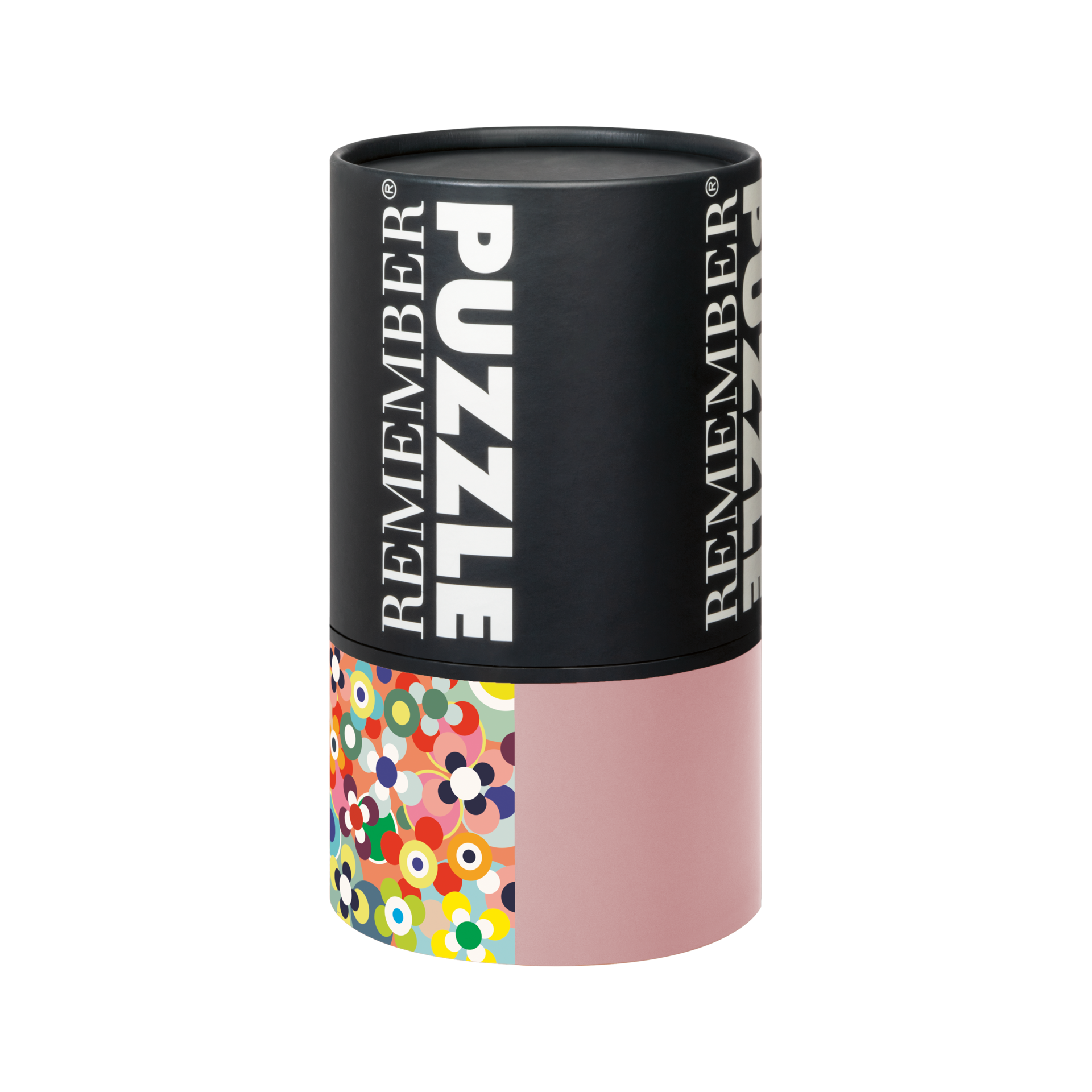 Confezione di puzzle cilindrico. La parte superiore è nera con la scritta bianca "REMEMBER PUZZLE". La parte inferiore è rosa con un motivo floreale colorato.
