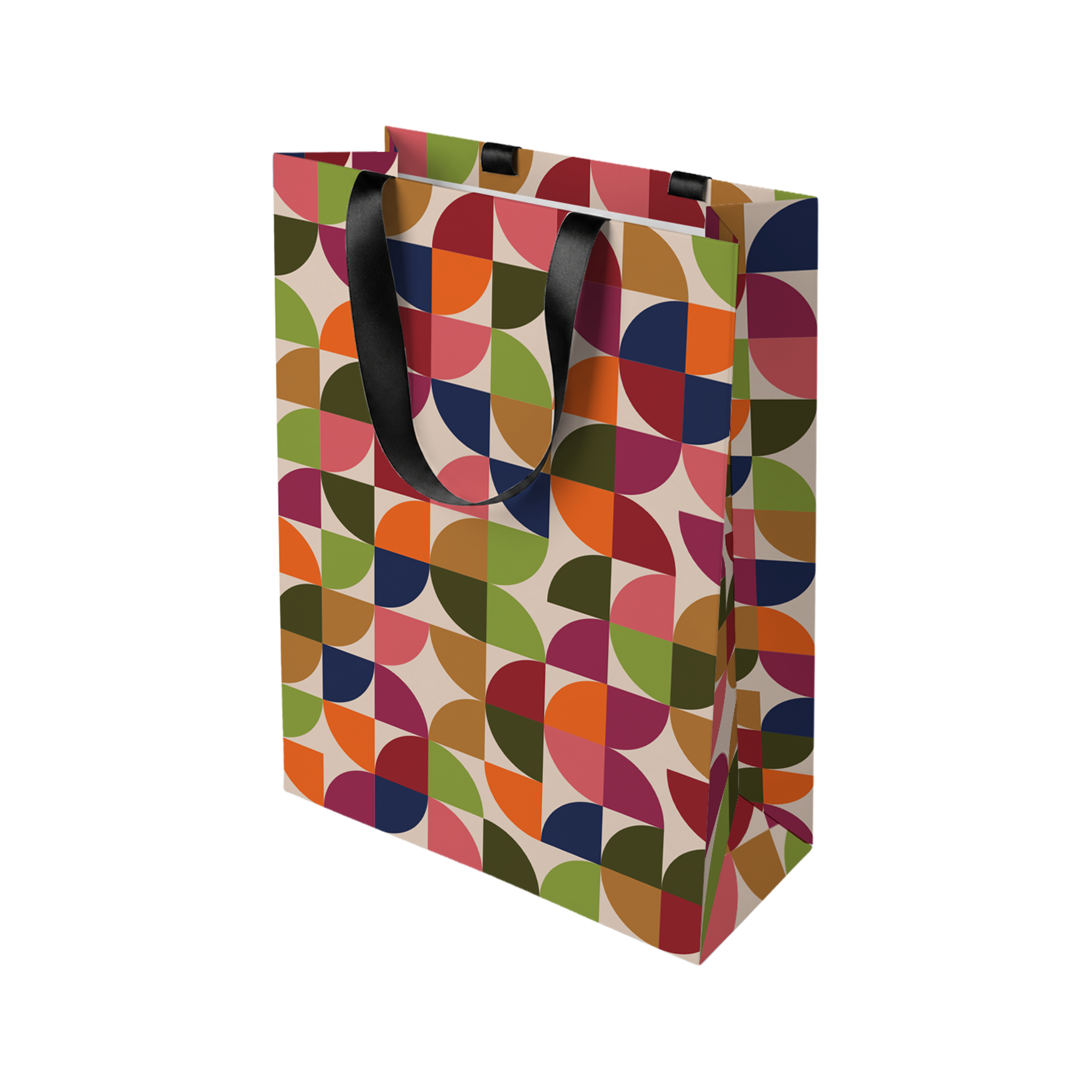 Bolsa de regalo multicolor con moderno estampado geométrico de cuartos y semicírculos en verdes, naranjas, rosas, rojos y azules sobre fondo beige claro. Con dos asas de cinta de raso negro. Ideal como bolsa «Joy».