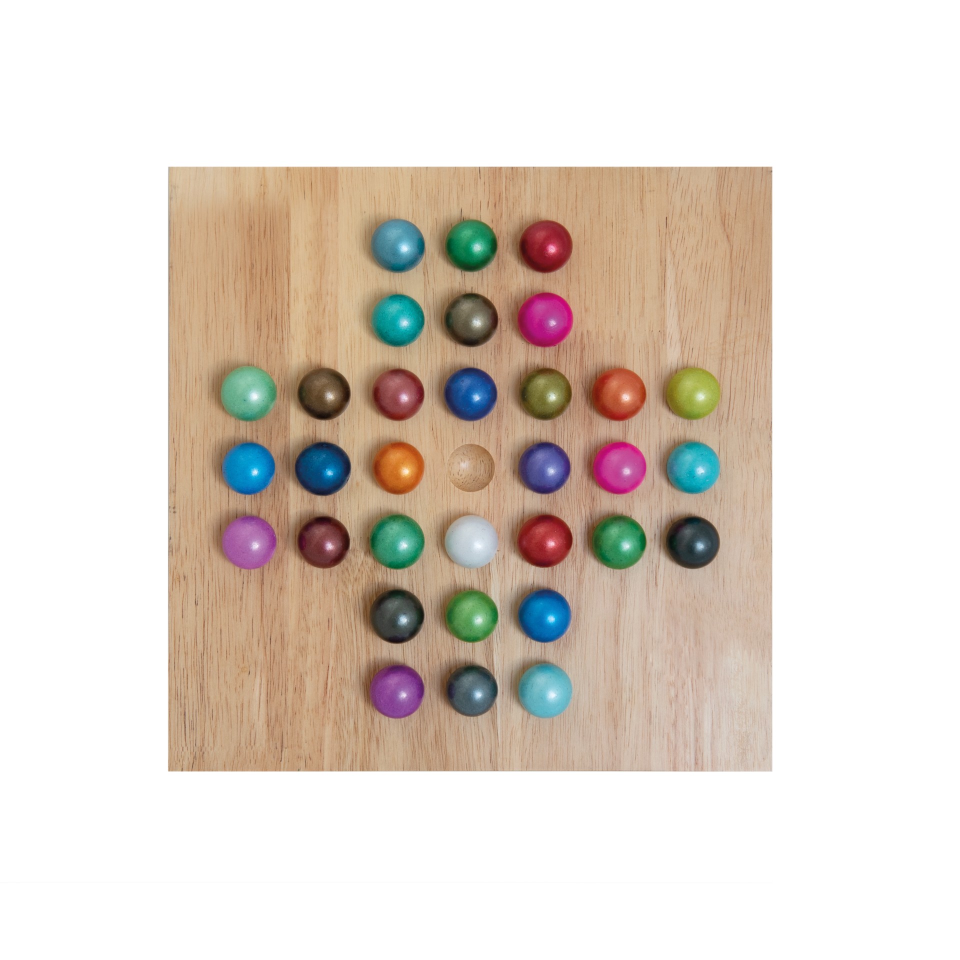 Top view of a solitaire game: Wooden board with coloured glass balls in the shape of a cross, one empty position in the middle.