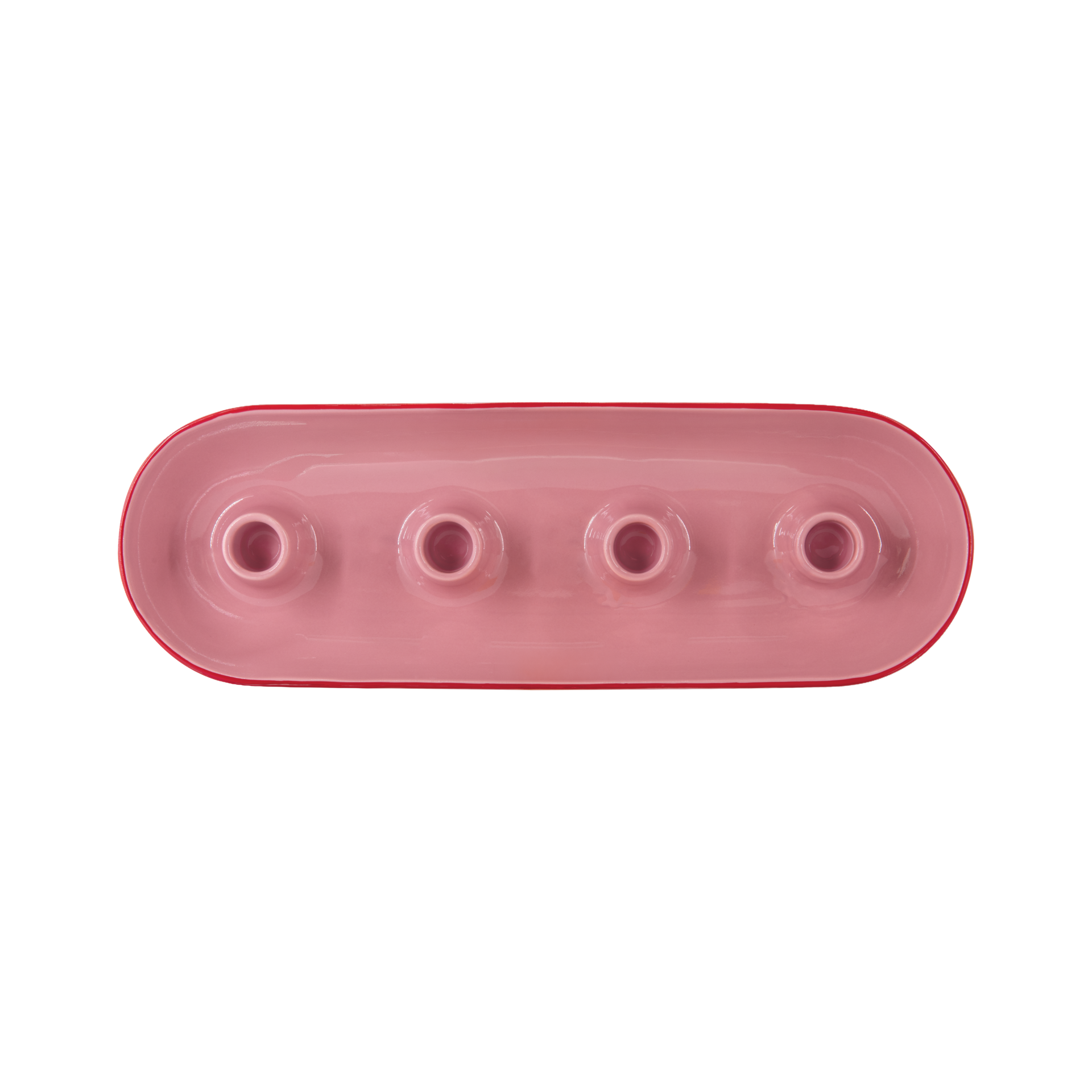 Coupe ovale pour couronne de l'Avent en céramique de dolomite rose brillante, vue du dessus. Cette coupe allongée comporte quatre supports ronds intégrés pour bougies cylindriques, alignés sur l'axe. Bordure rose foncé.