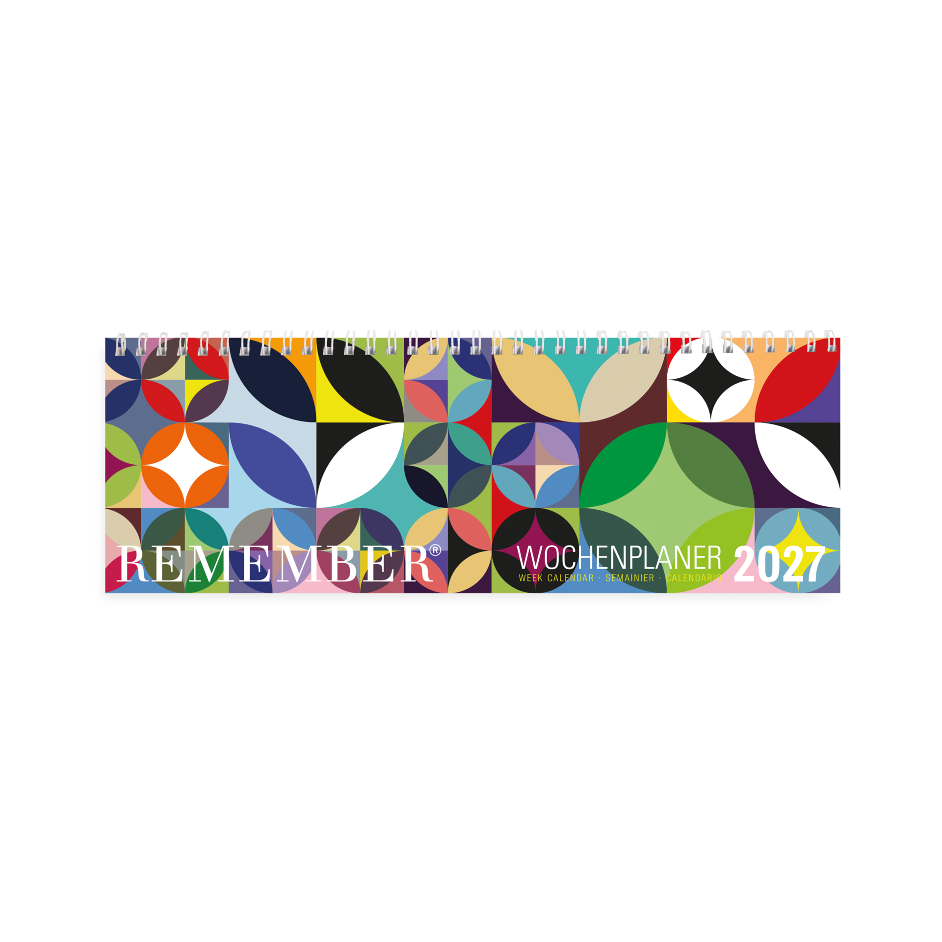 Colourful weekly planner 2027 with top-bound spiral binding, ideal for desk-based scheduling. Front cover: vibrant abstract pattern of geometric shapes in blue, green, red and yellow. White lettering: ‘REMEMBER ’ and ‘WEEKLY PLANNER 2027’.